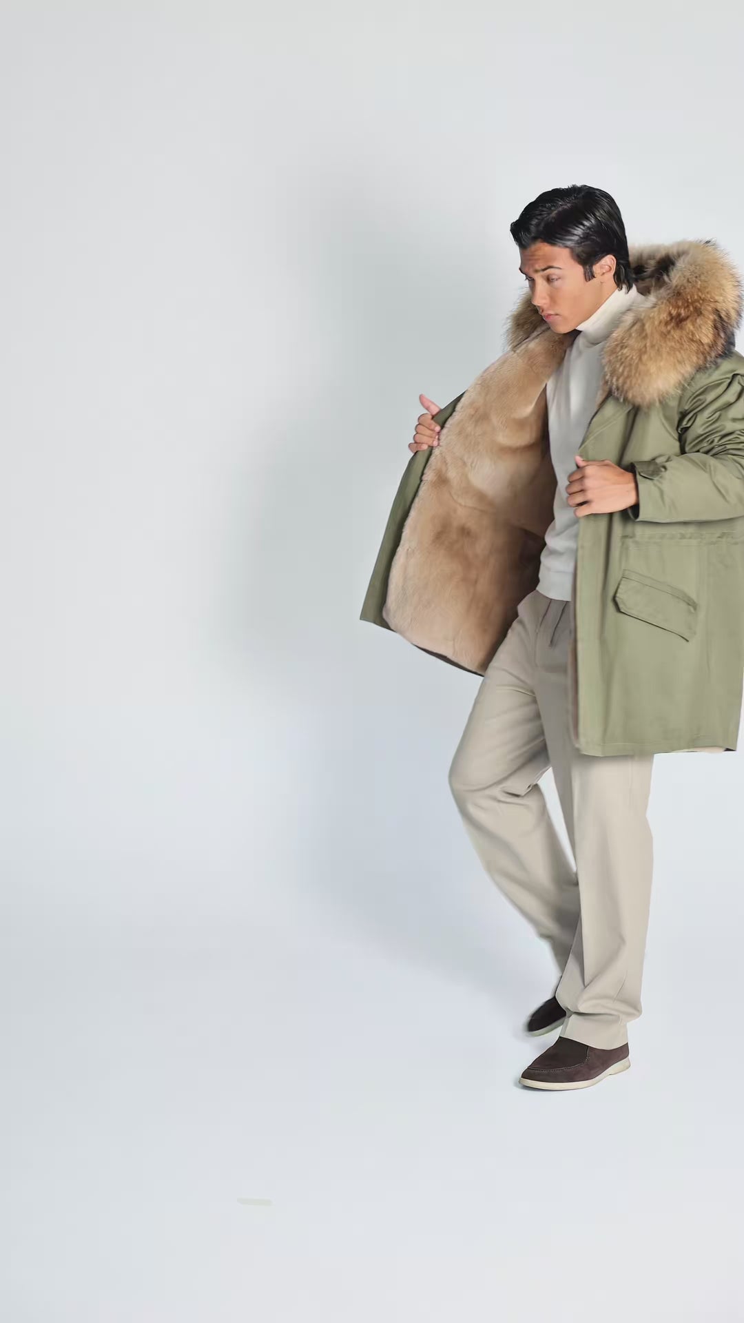 LONG PARKA WITH FINLAND RACCOON